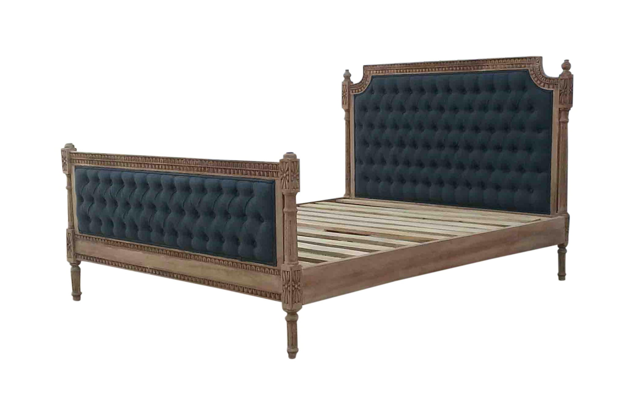 Elegant wooden bed with blue tufted headboard.